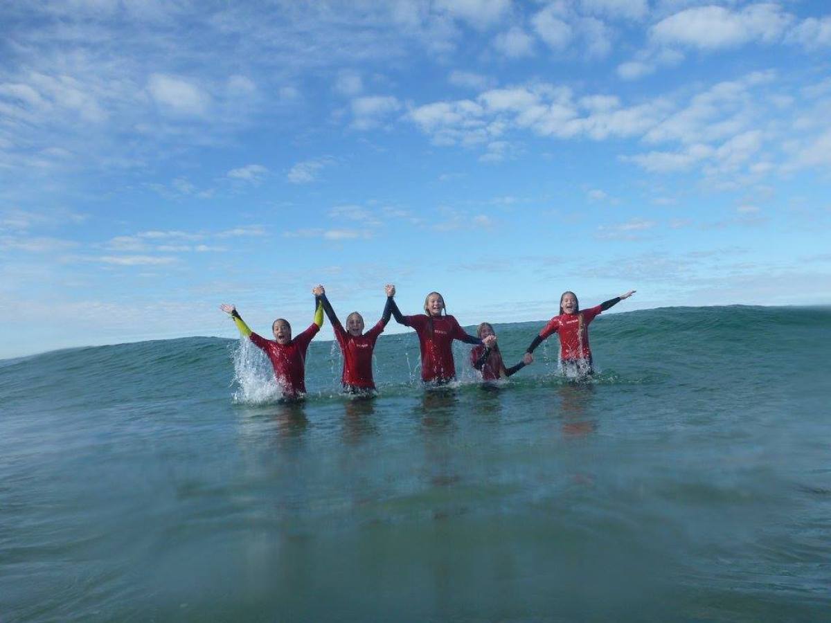 Young girls having fun on the beach